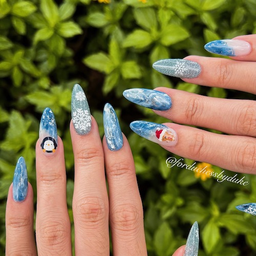 Intricate nail art showing off the skills of our nail techicians